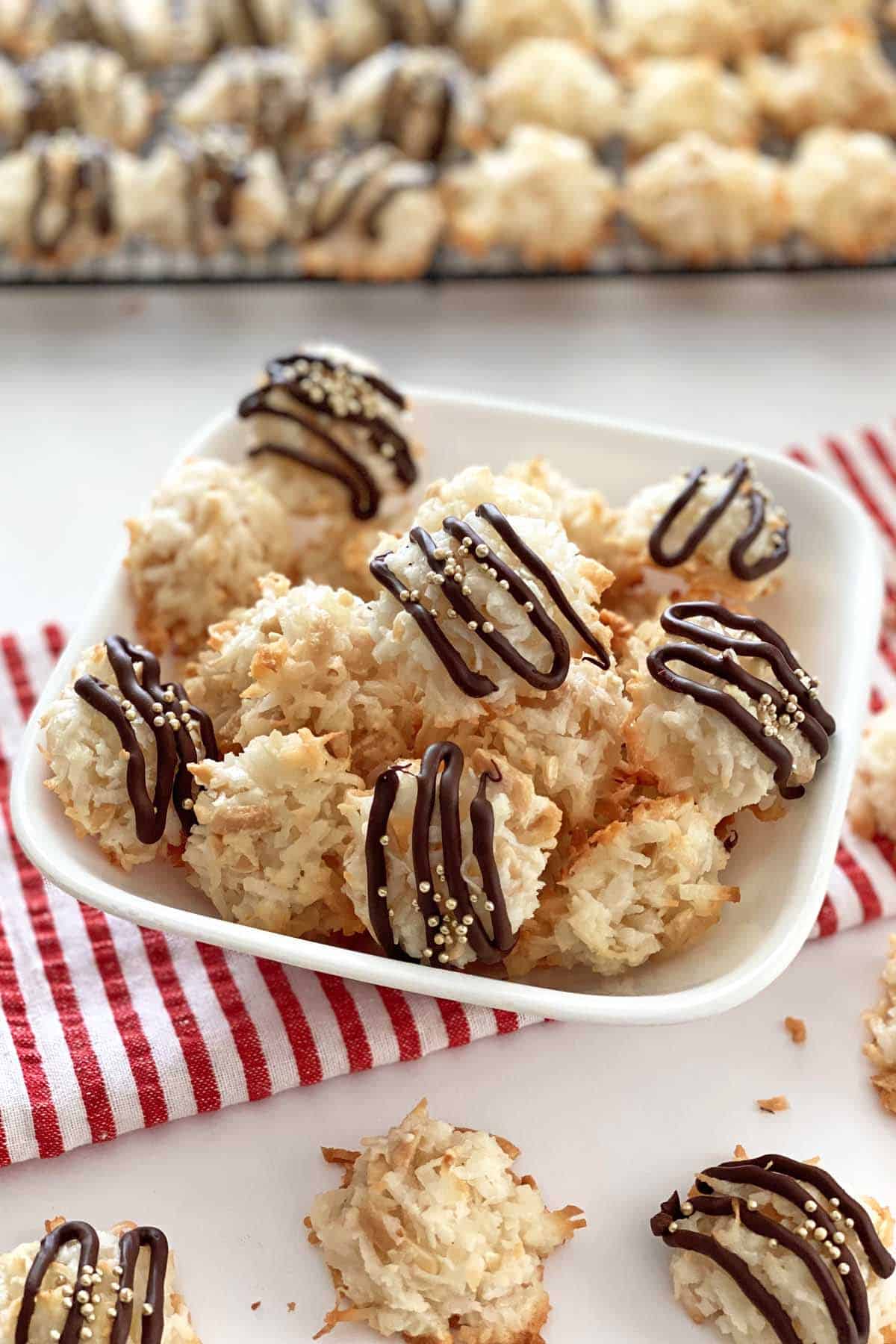 Coconut almond macaroons in a white serving bowl.