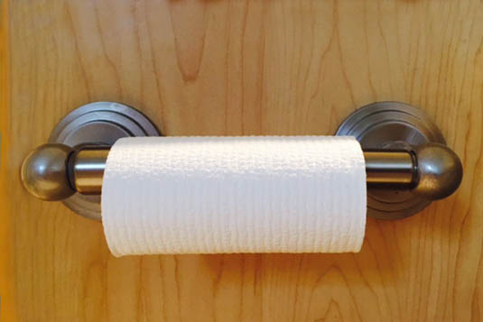 Almost empty toilet paper roll