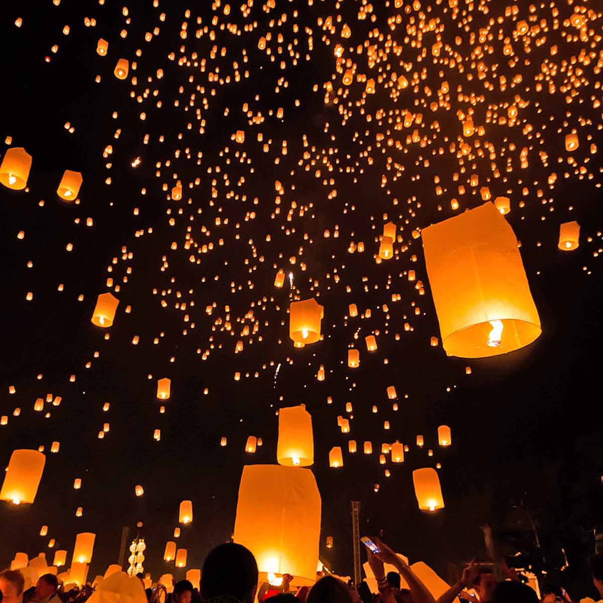 Releasing lanterns into the sky and letting go of negative things.