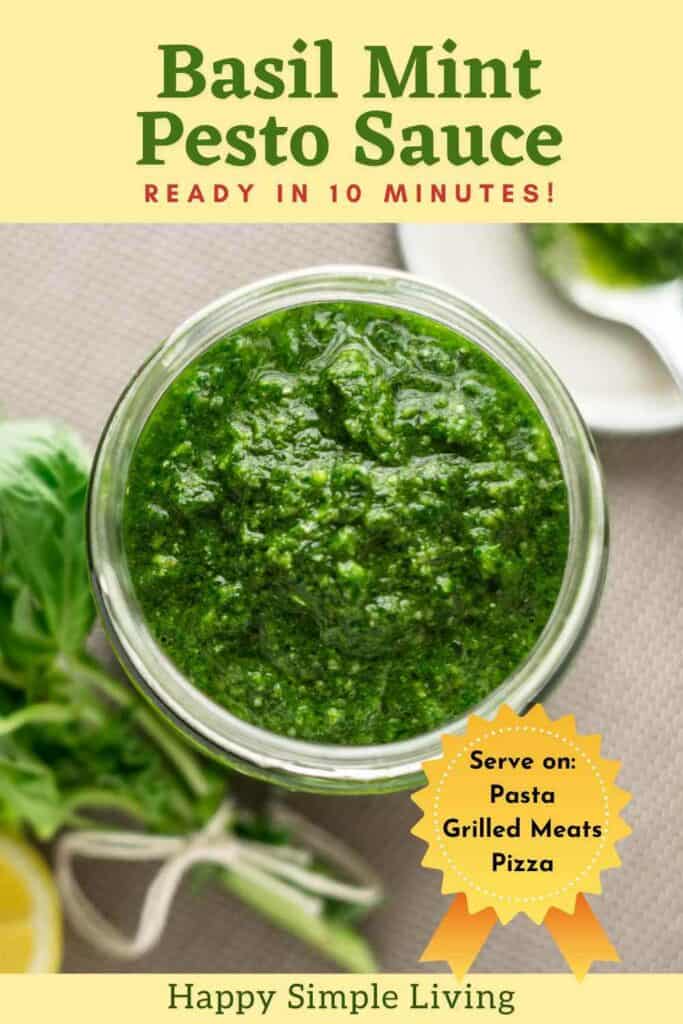 A jar of basil mint pesto sauce on a light background with fresh herbs and lemon nearby. Text highlights its quick preparation time and suggests serving on pasta, grilled meats, and pizza. The label reads Happy Simple Living.