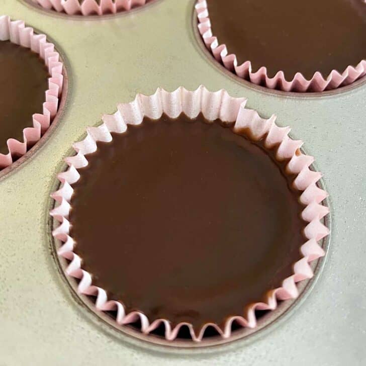 Close up of mini chocolate cake with chocolate ganache glaze.