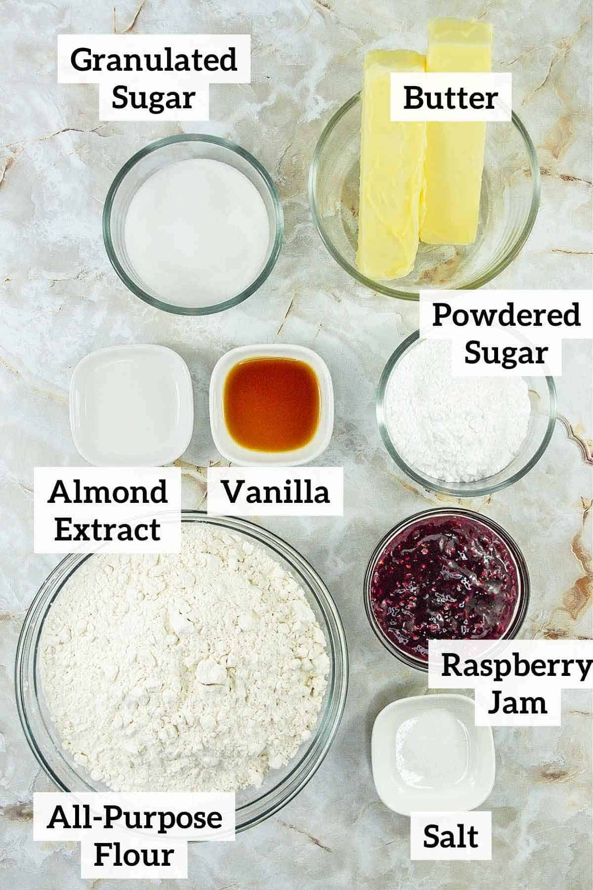 Flour, sugar, butter and ingredients to make cookies.