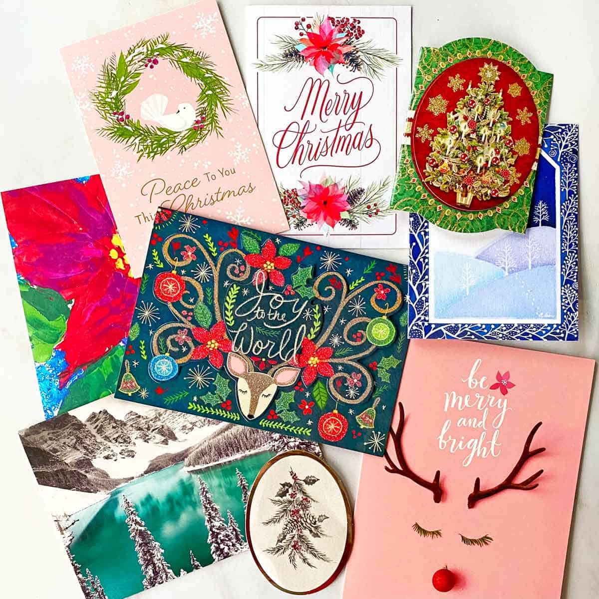 Nine Christmas cards ready to be repurposed.