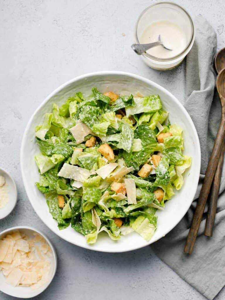 Garlic Caesar Salad in a white serving bowl.