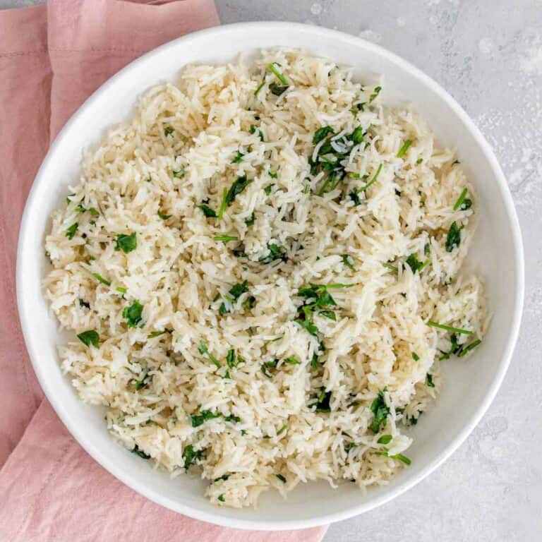 A white bowl filled with cilantro lime rice.