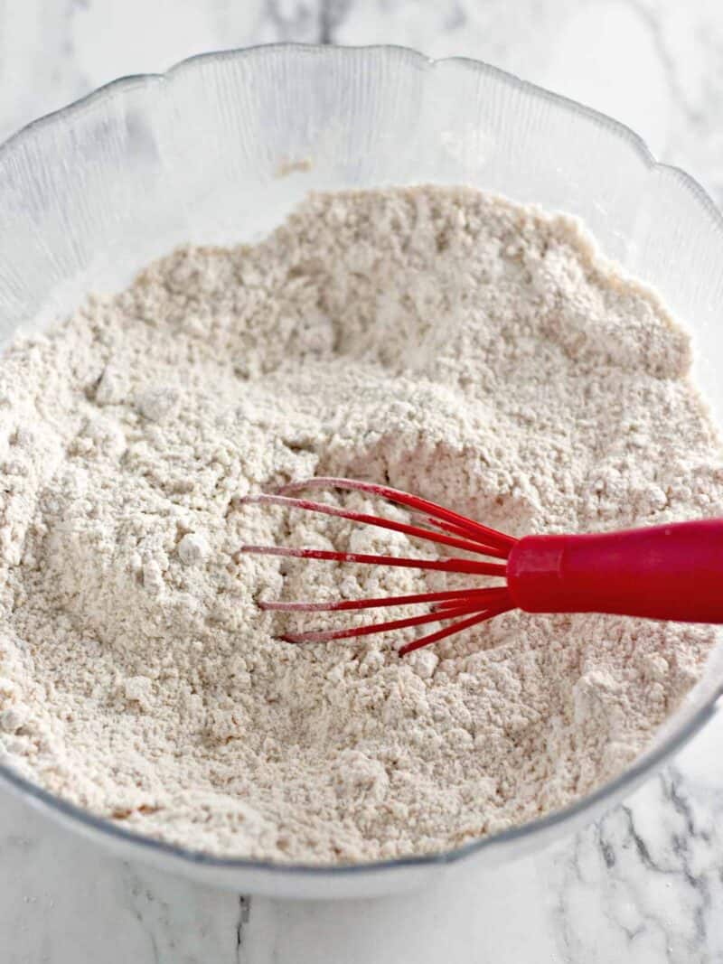 Whisking together the flour, brown sugar, and salt.
