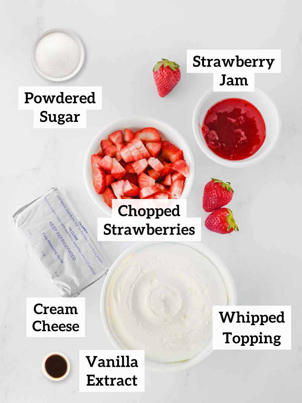 Powdered sugar, chopped strawberries, strawberry jam, cream cheese, whipped topping, ad vanilla.