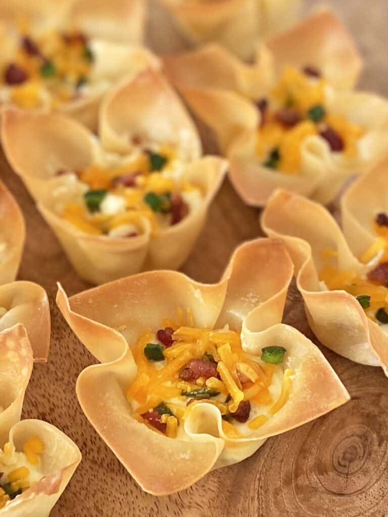 Six golden brown jalapeno popper cheese wontons.