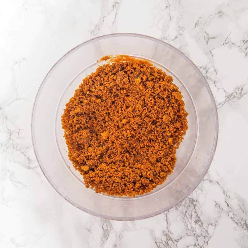 Biscoff cookie crumbs mixture in a bowl.