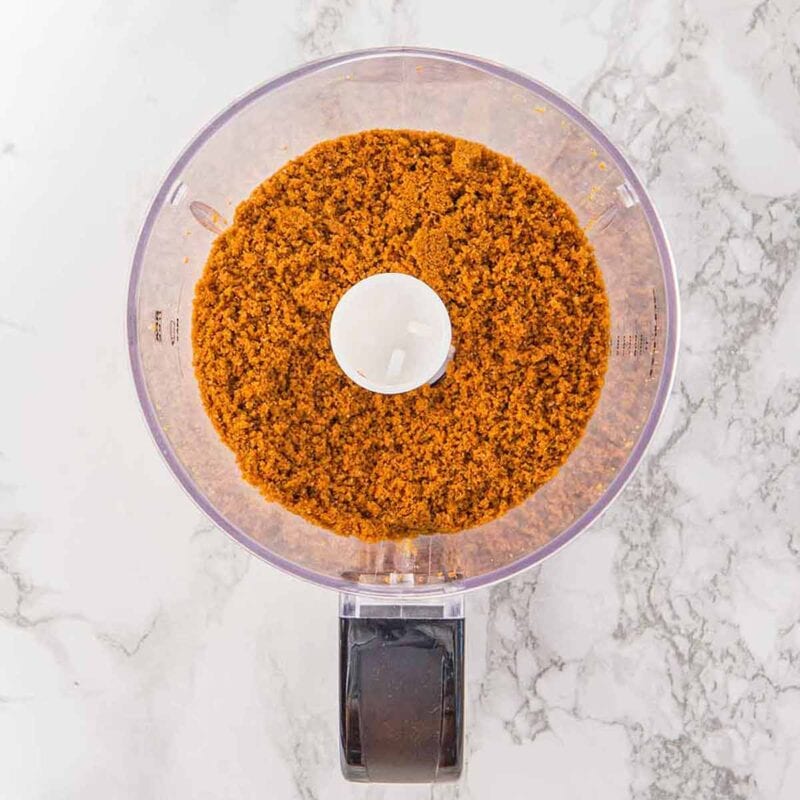 Biscoff cookie crumbs in the food processor.