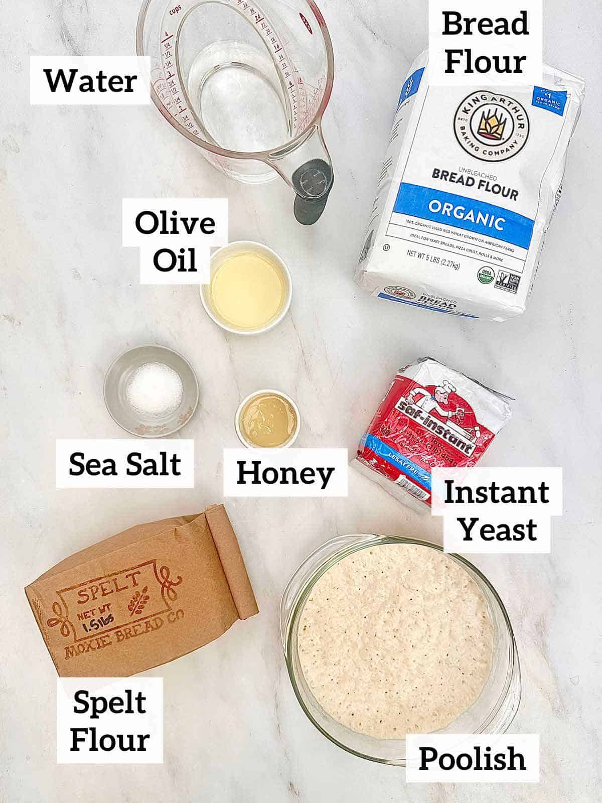 Spelt flour, water, olive oil, bread flour, sea salt, honey, poolish and instant yeast.