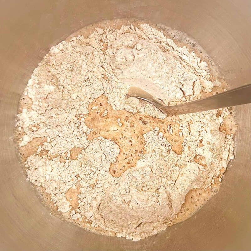 Spelt pizza dough dry ingredients in a bowl.